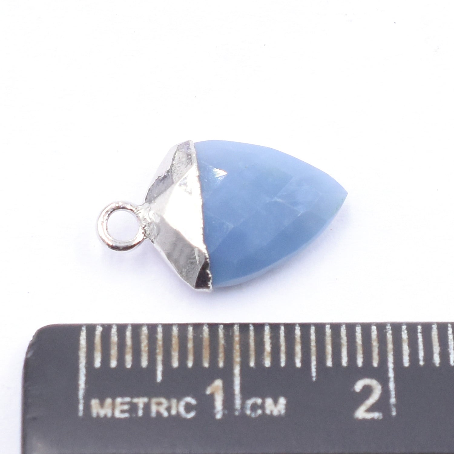 Unique Blue Opal Shield shaped pendant with silver detailing