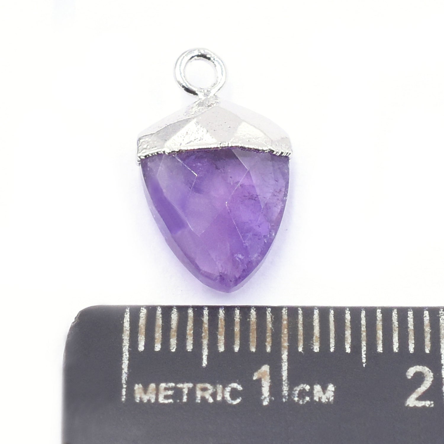 Amethyst pendant with rectangular shape and gold edges