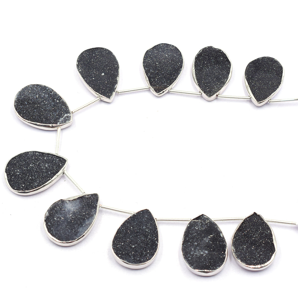 Silver plated bezel strand with black druzy pear stones