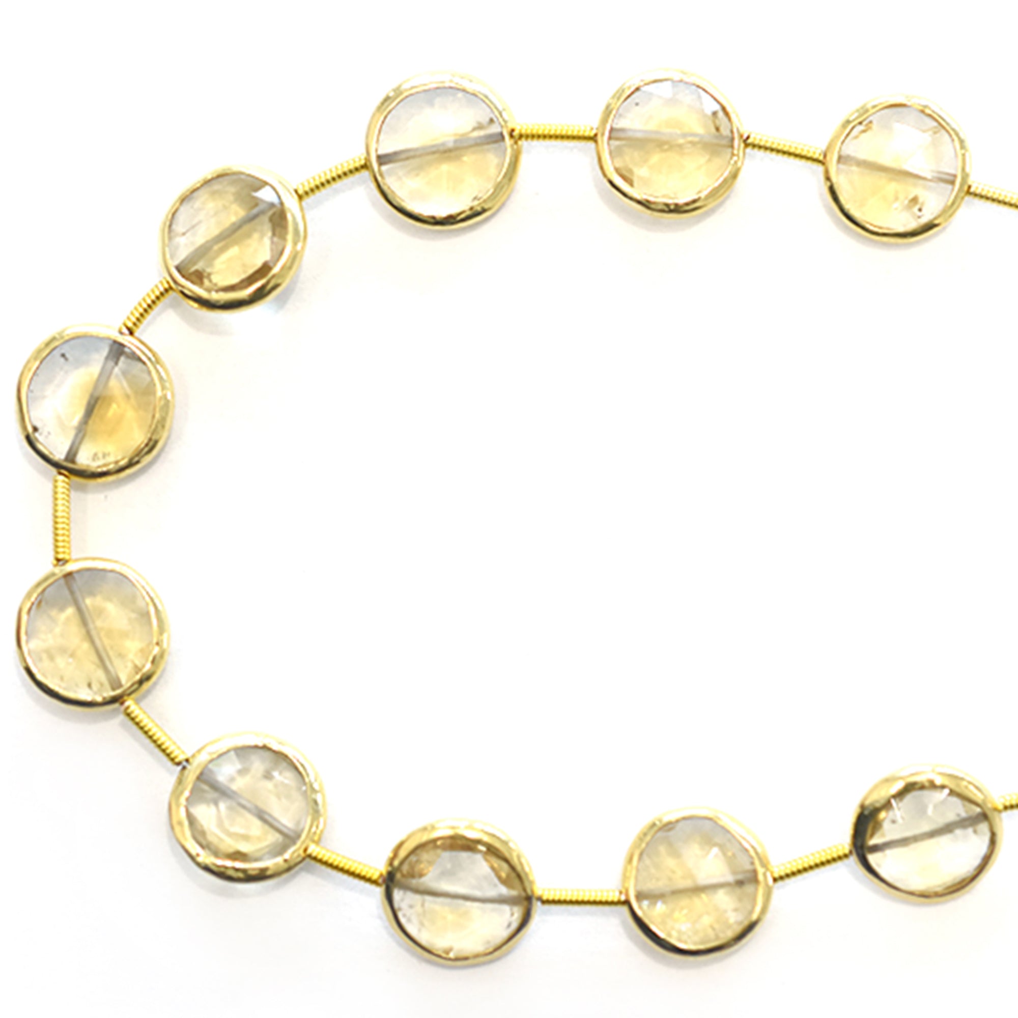 Bright round citrine gemstones in silver bezel