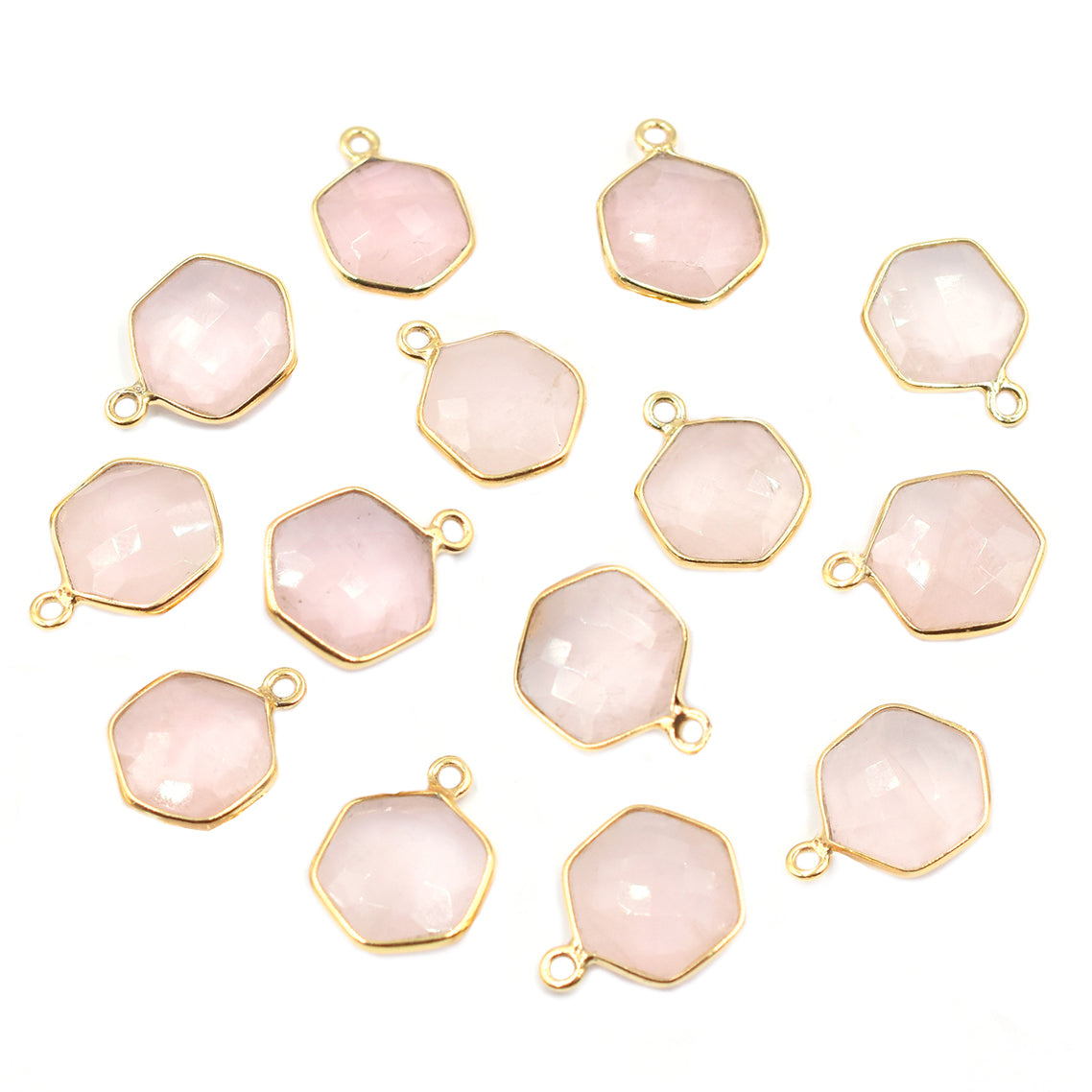 Hexagon-shaped rose quartz set in silver vermeil pendant