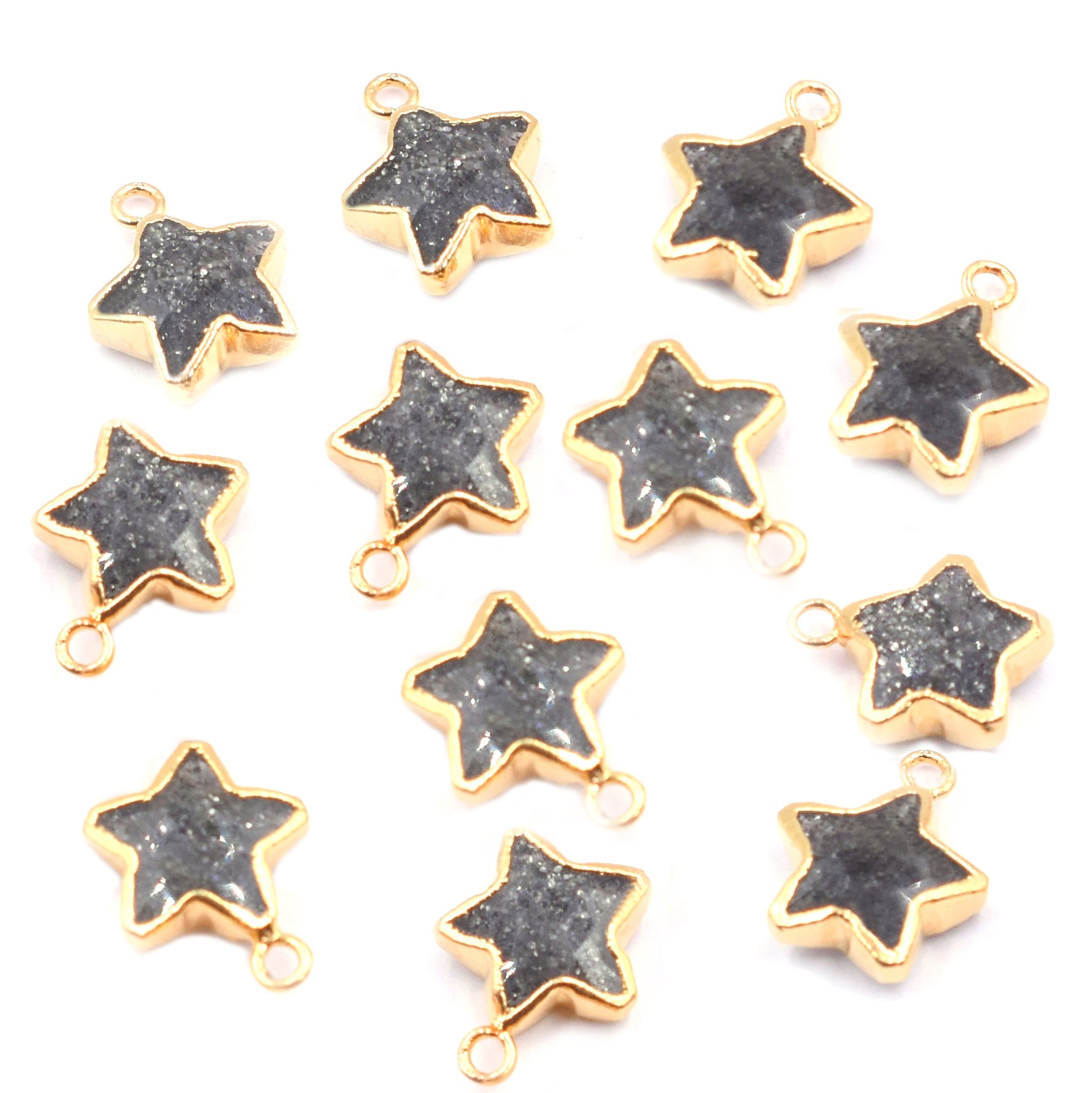 Elegant Black Sunstone star pendant in gold frame