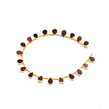 pear shaped Garnet pendant with gold finish