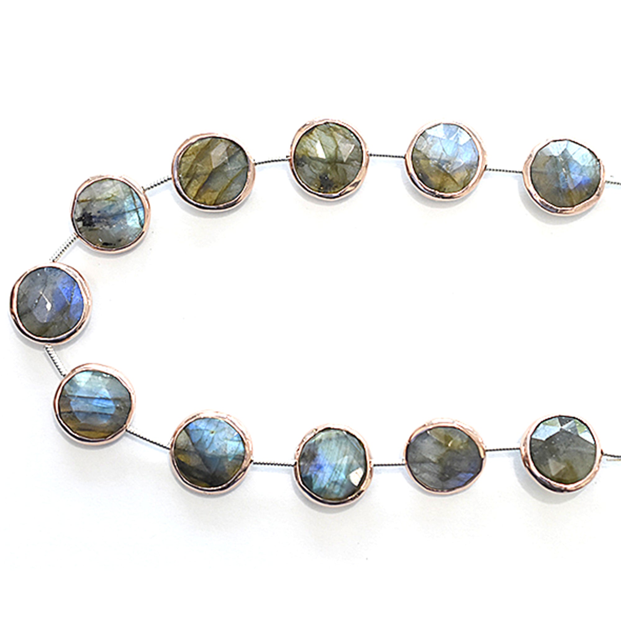 Colorful round labradorite gemstones in silver bezel