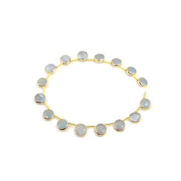 Round shaped aquamarine pendant with gold plating