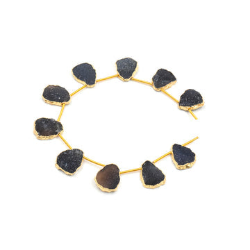 Black druzy uneven shape strand with gold electroplated finish