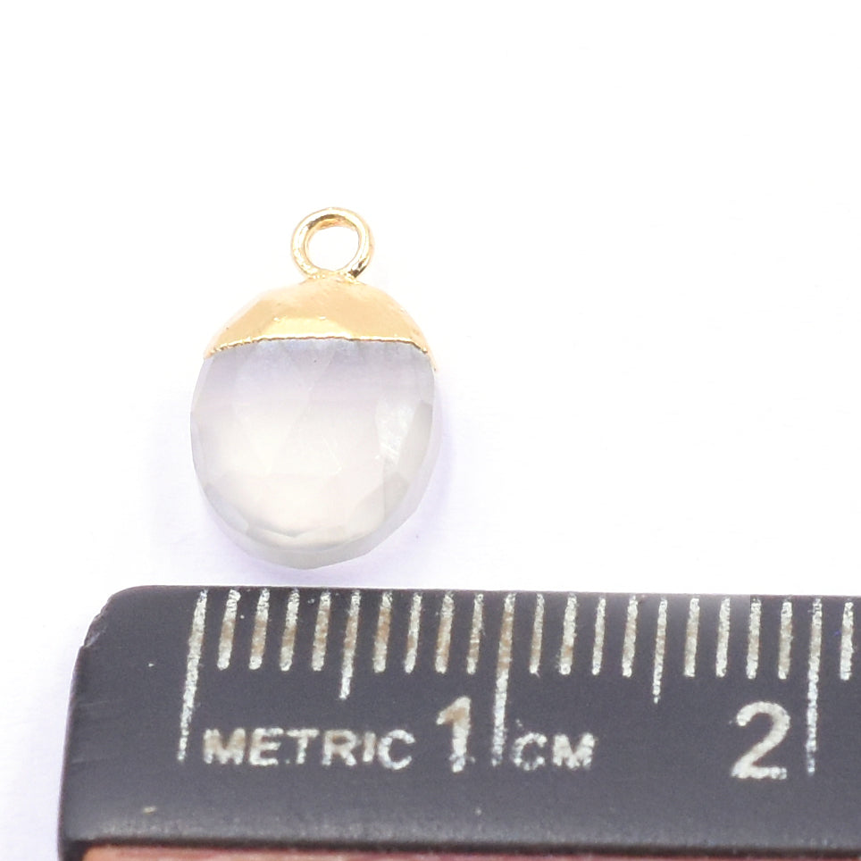 Elegant oval shaped Chalcedony pendant with gold detailing