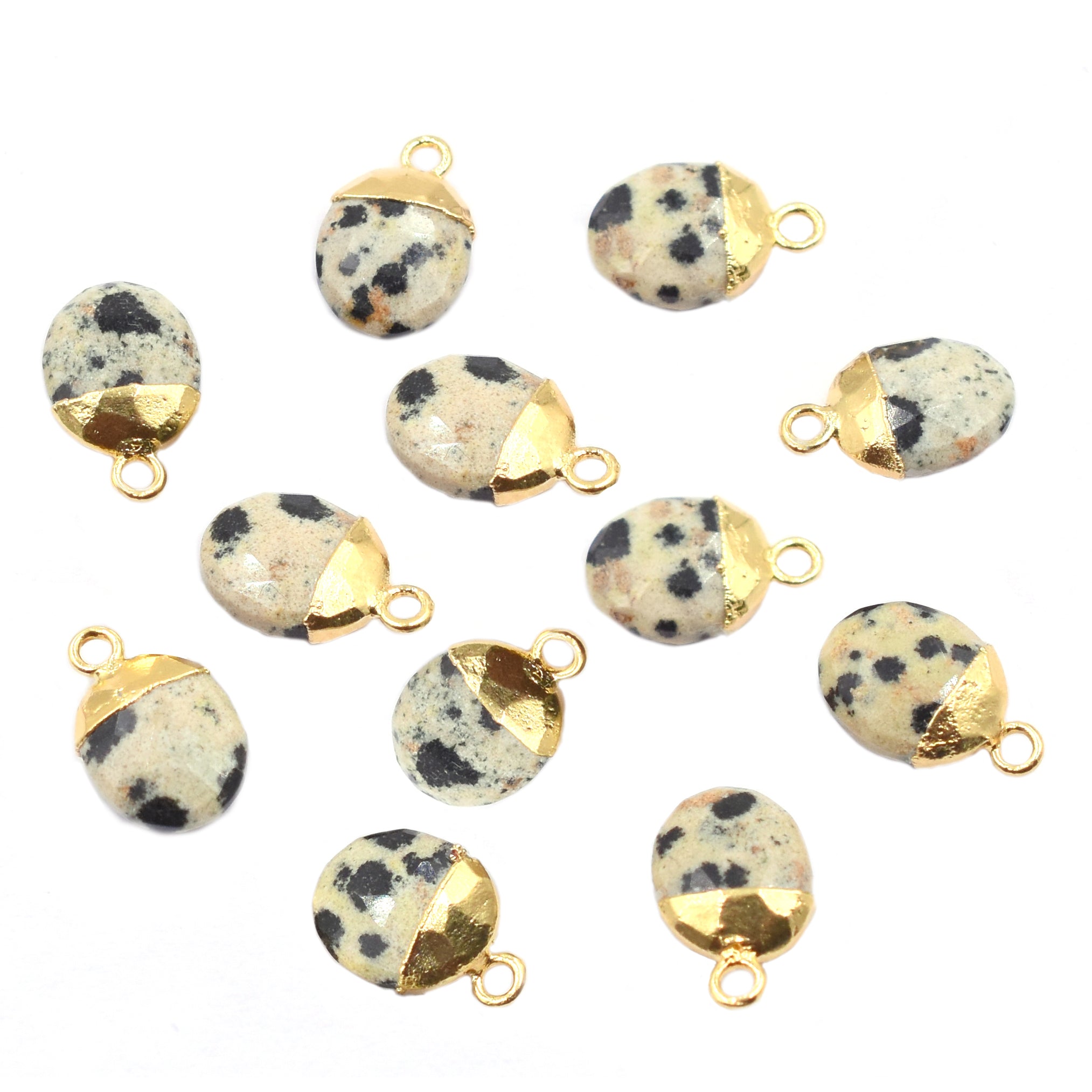 oval shaped Dalmatian Jasper pendant with gold finish