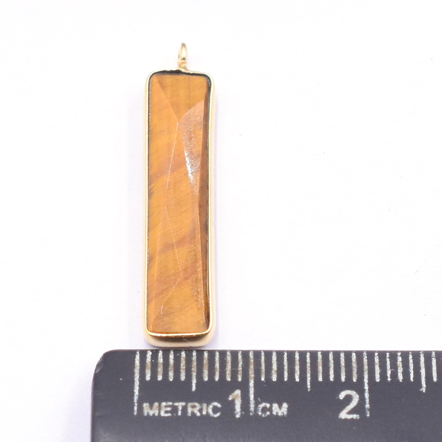 Grounding tiger eye rectangle pendant featuring a vermeil finish