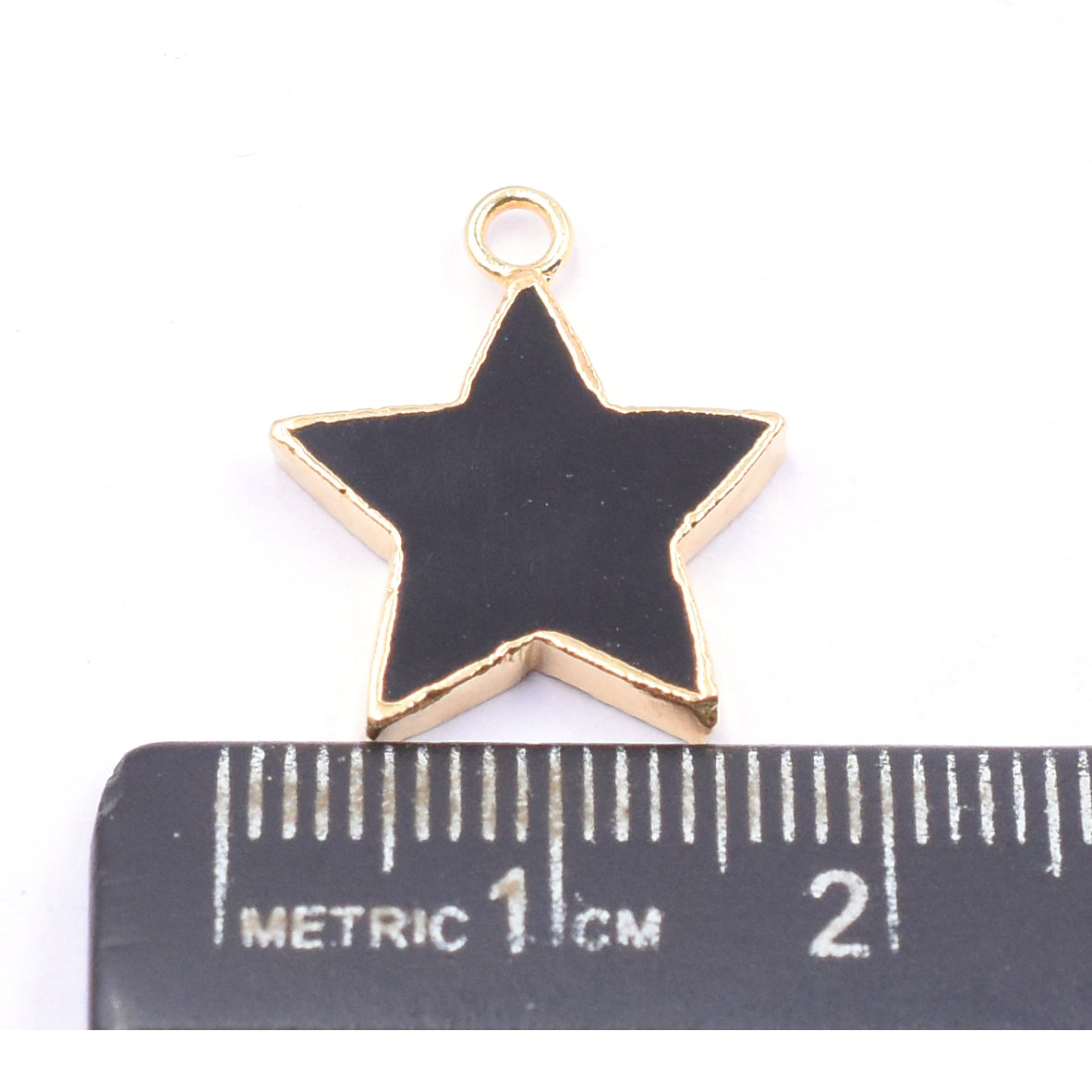 Black Onyx star pendant in a sleek silver electroplated setting