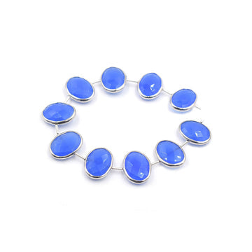 Blue chalcedony oval gemstone in silver plated bezel