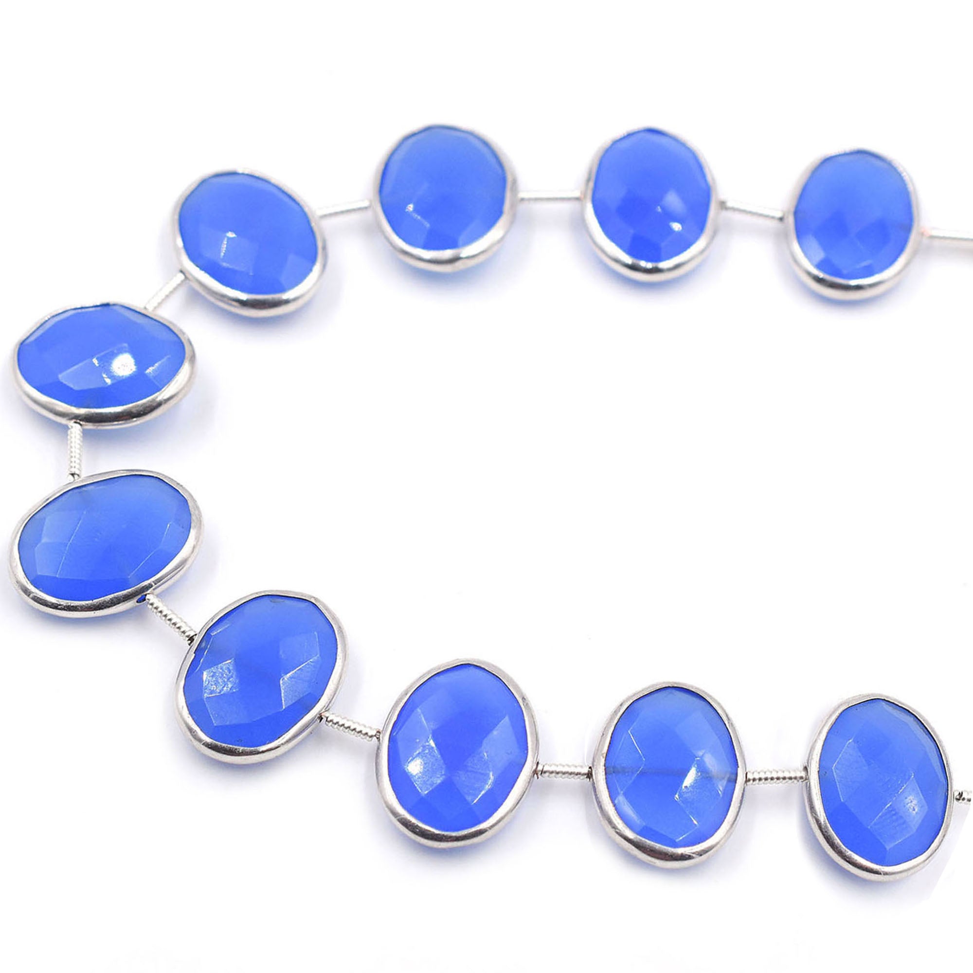 Oval-shaped blue chalcedony set in silver plated bezel