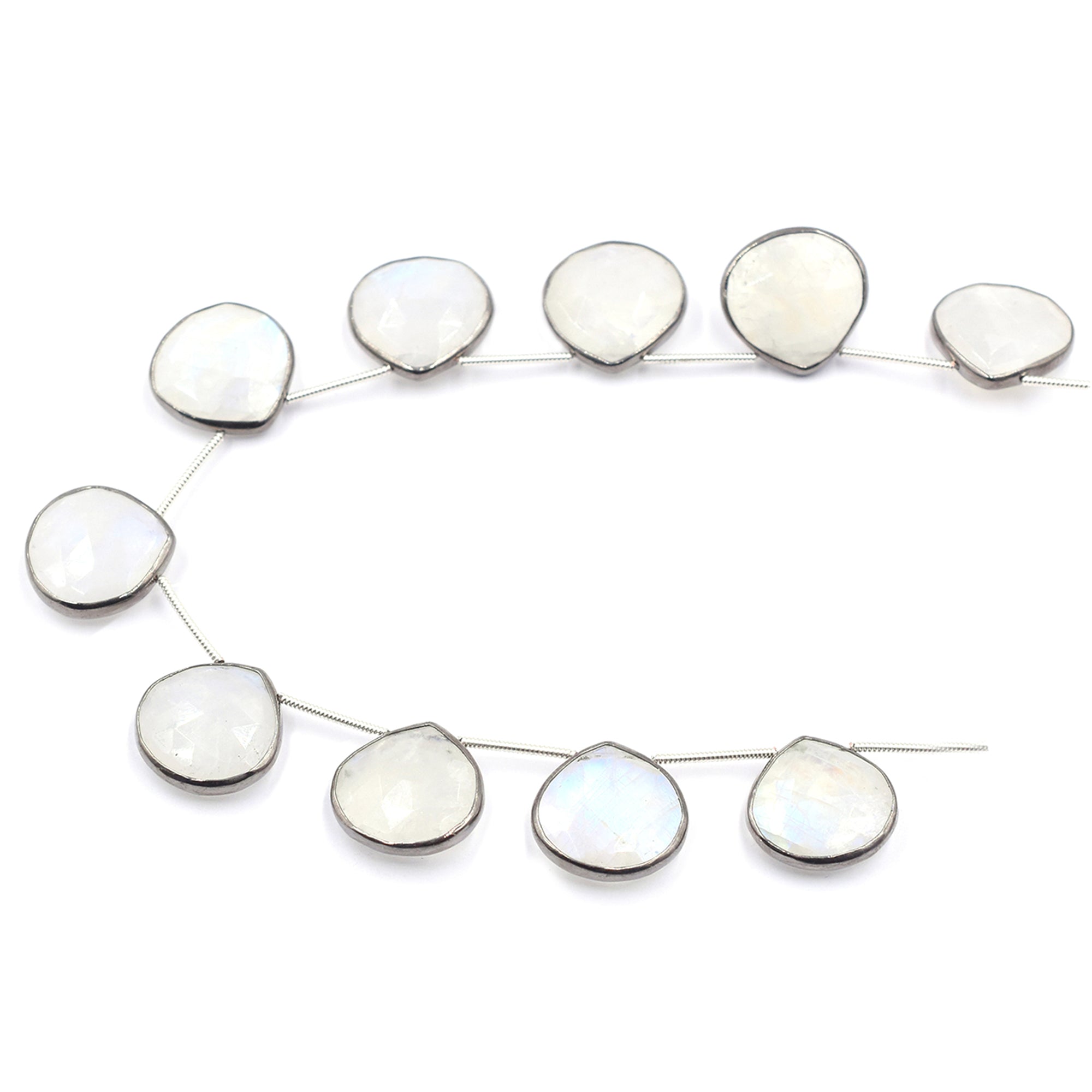 Heart-shaped rainbow moonstone set in black silver plating