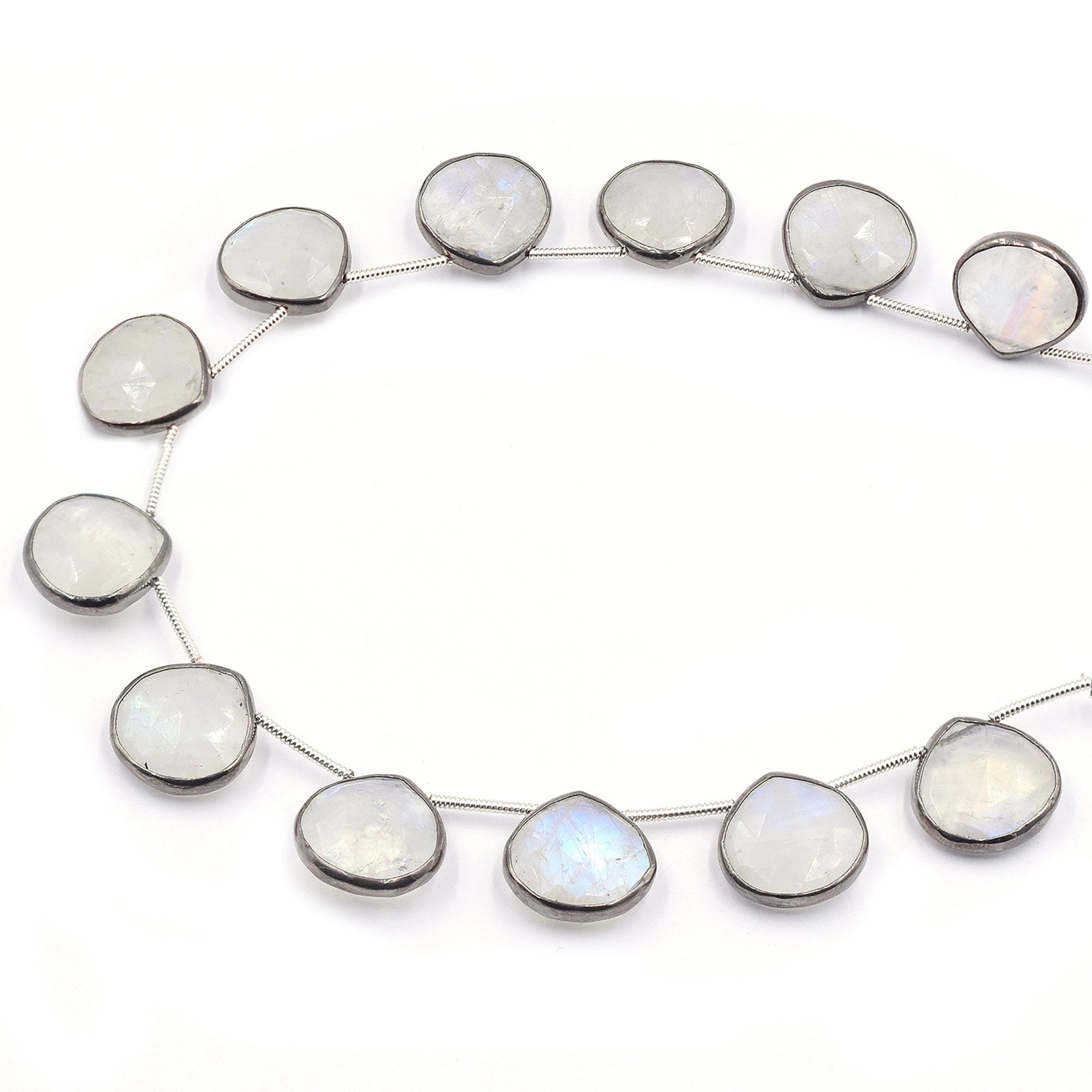 Heart-shaped rainbow moonstone set in black silver plating