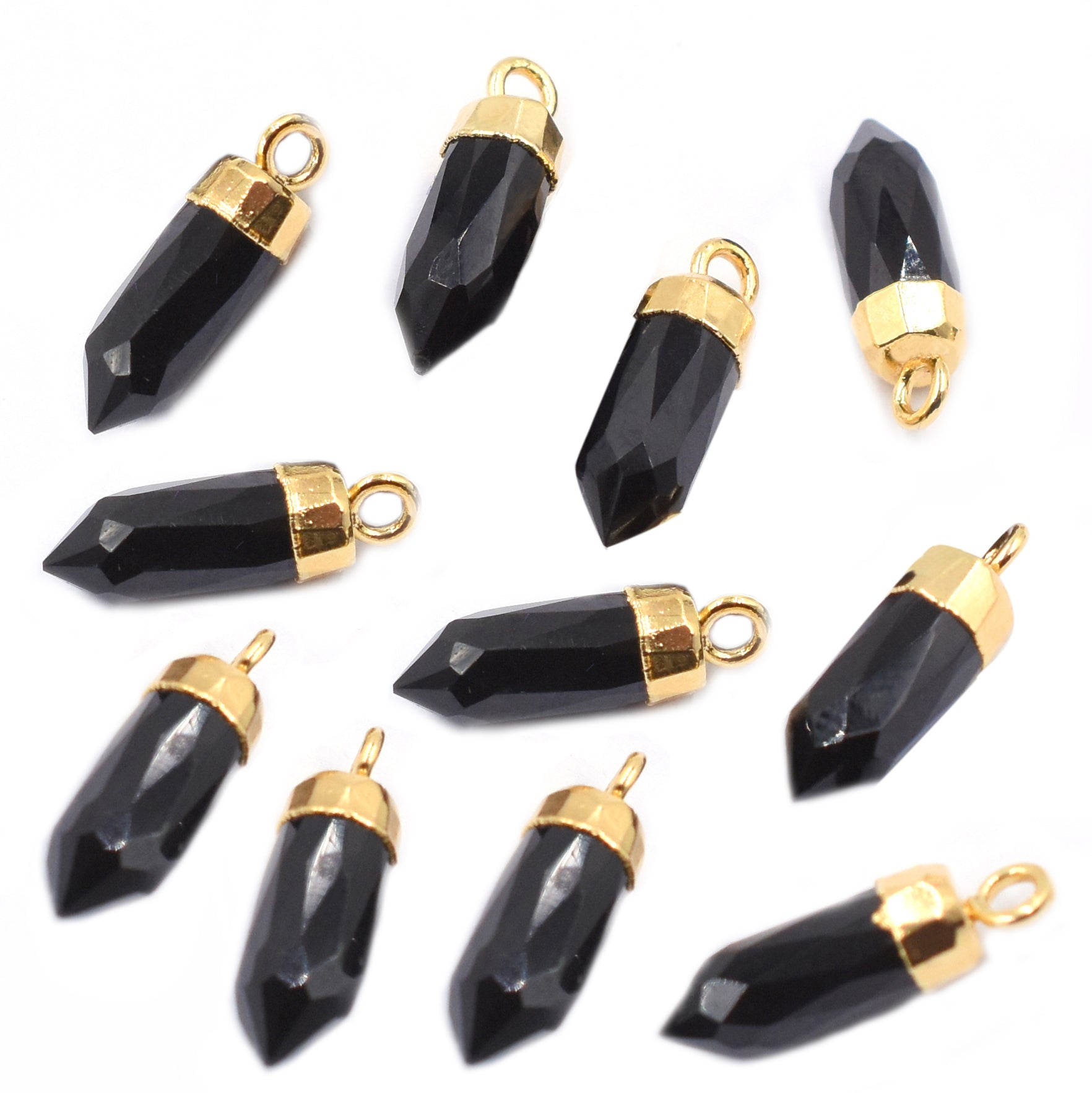 Polished black onyx stone in an Bullet shape with a gold-plated finish