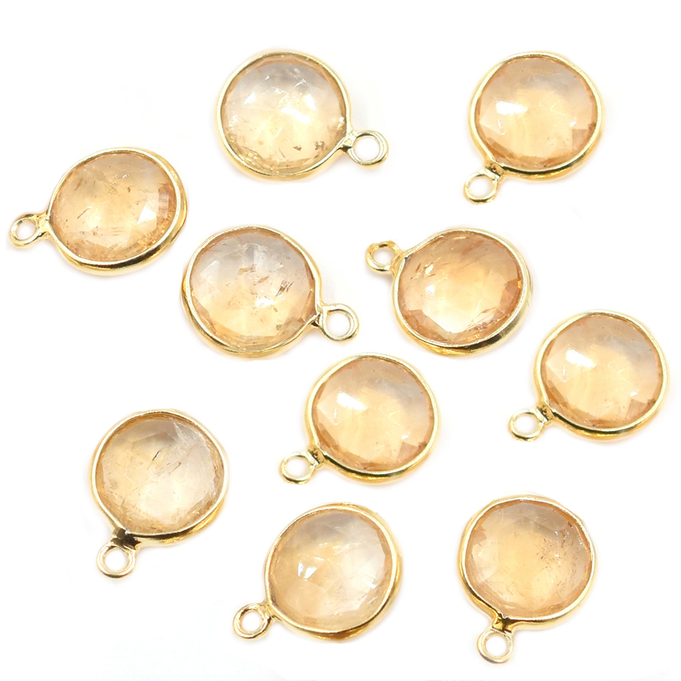 Round citrine gemstone with silver vermeil setting