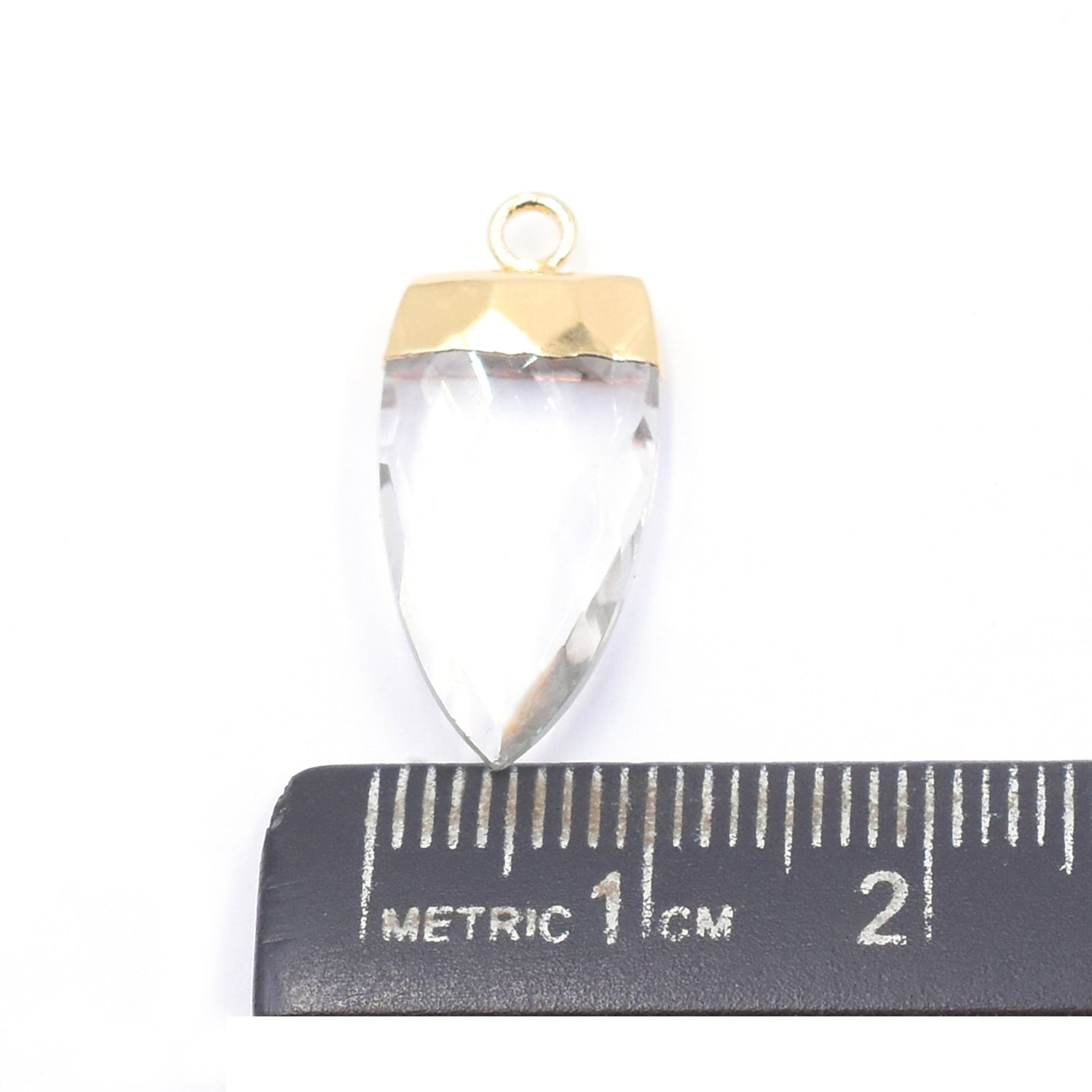 Arrow shaped Crystal Quartz pendant in gold