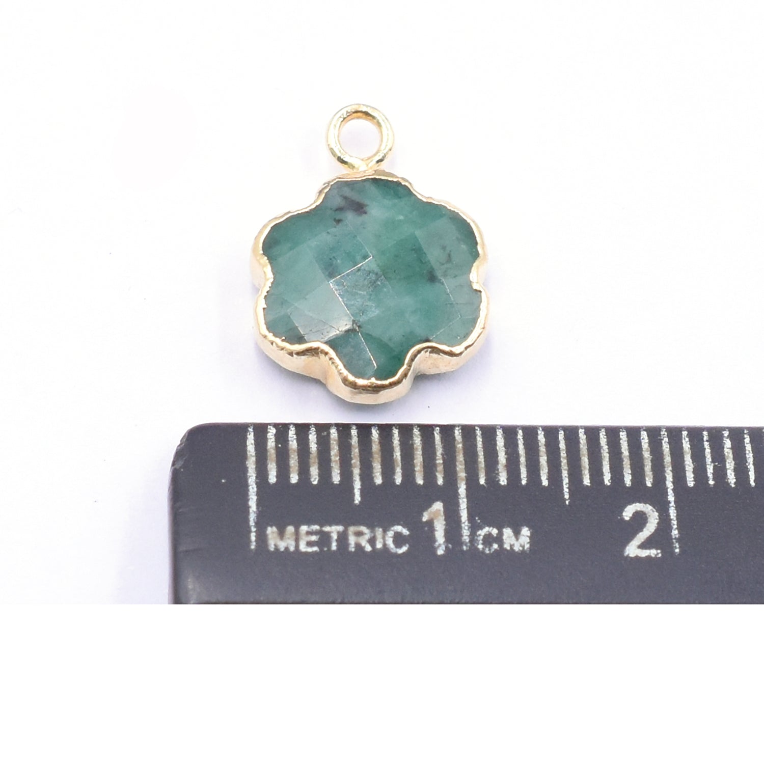 Gold electroplated clover pendant with emerald stone