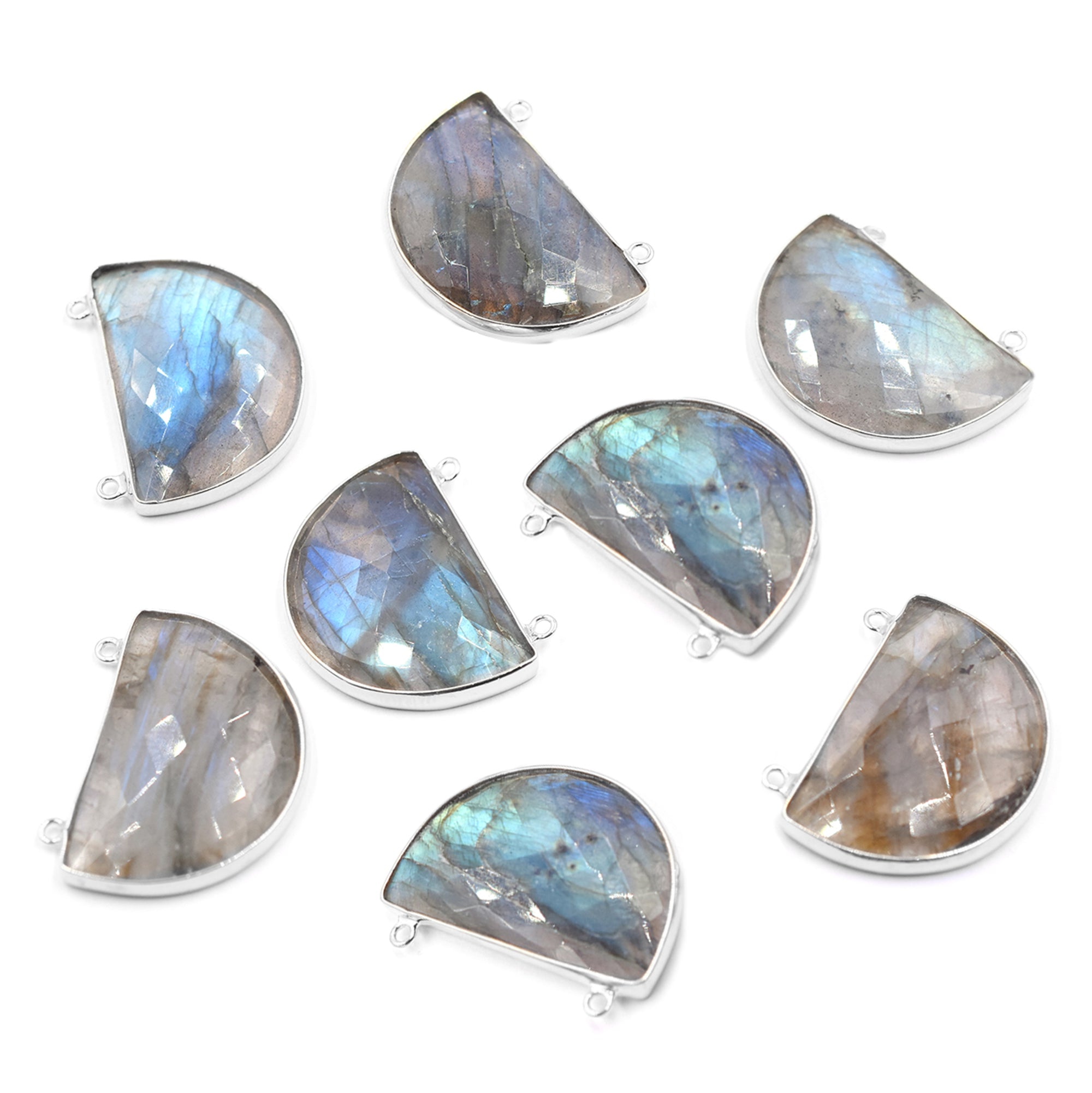 Half round-shaped labradorite set in silver plated pendant