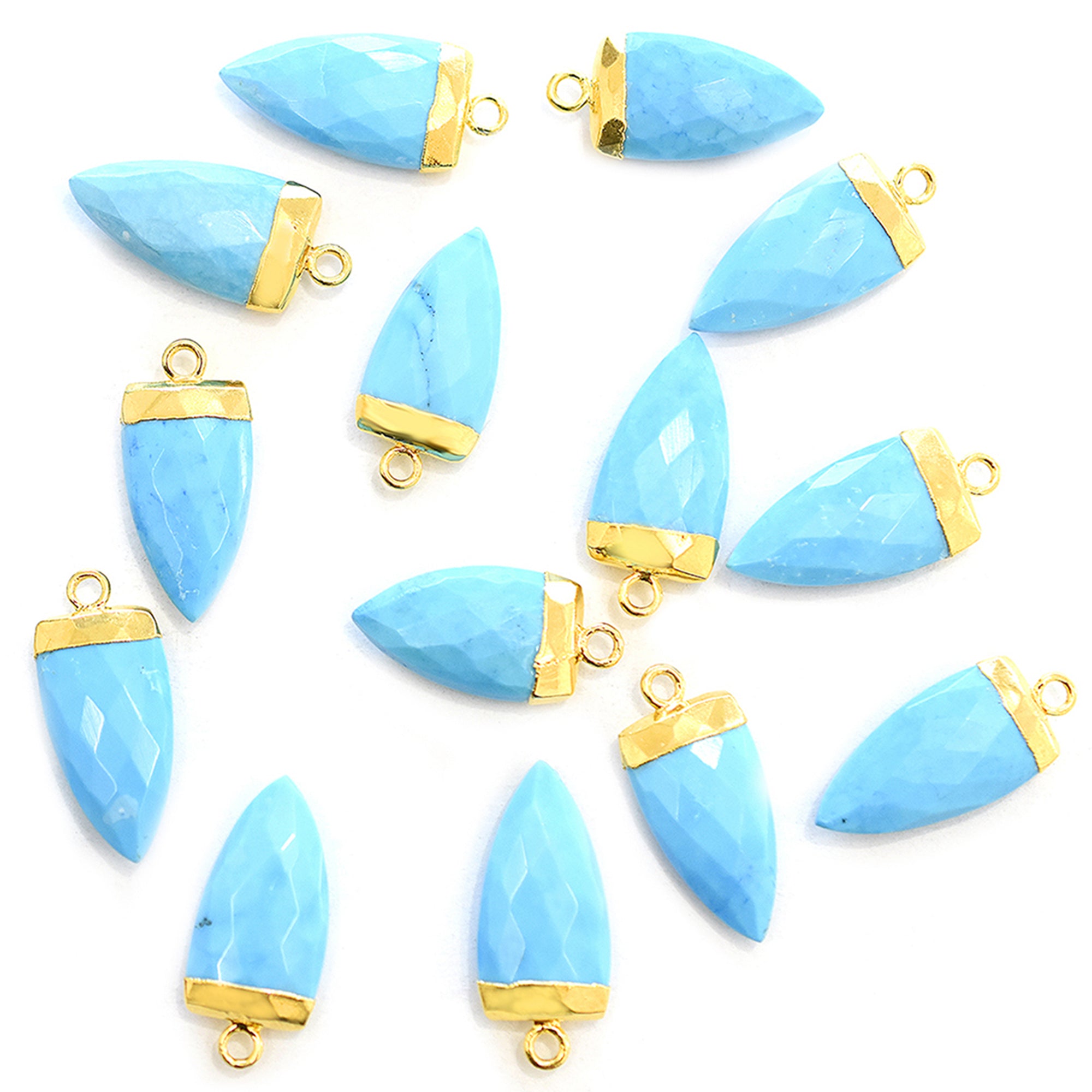 Howlite arrow shaped pendant with gold finish