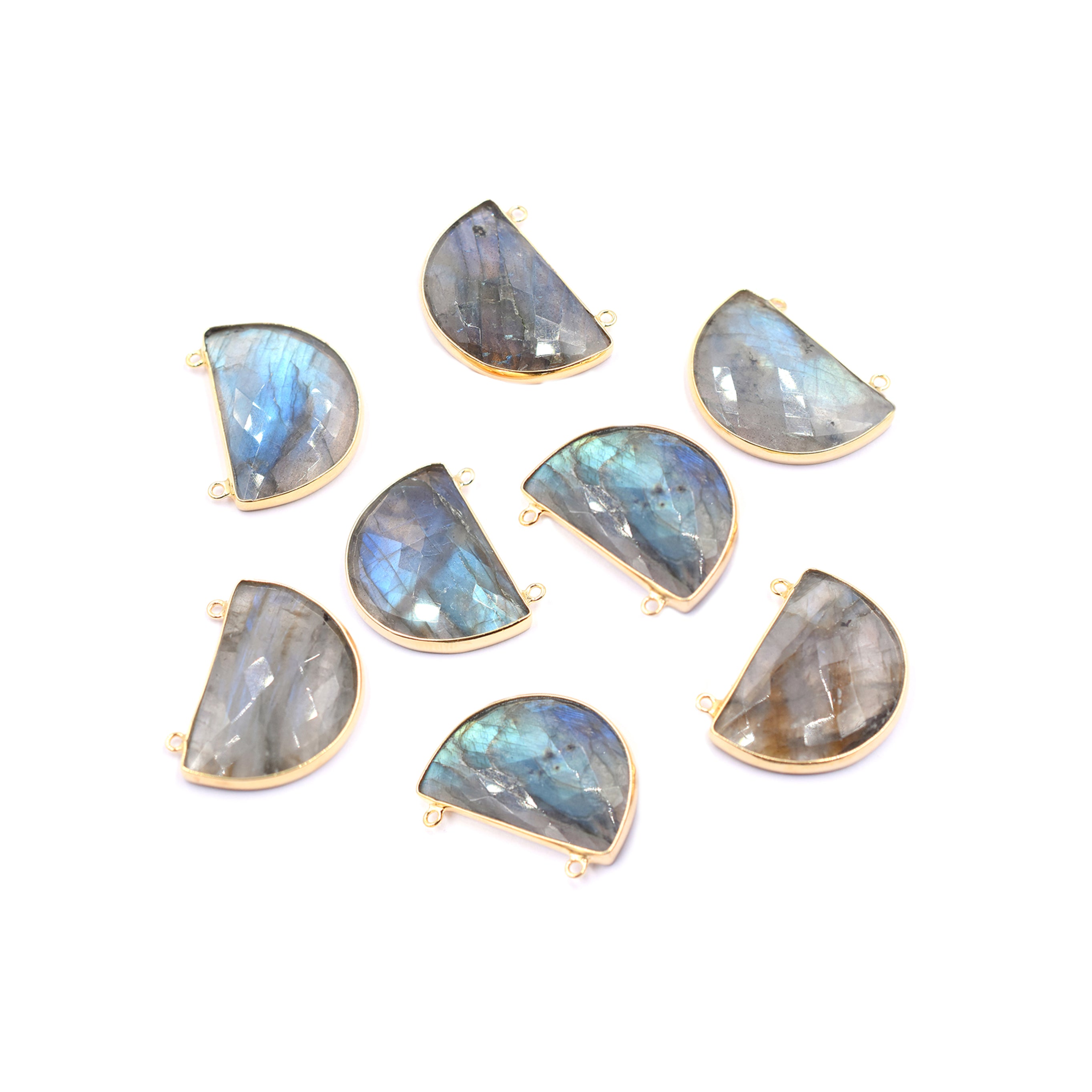 Labradorite half round-shaped gemstone in silver vermeil bezel