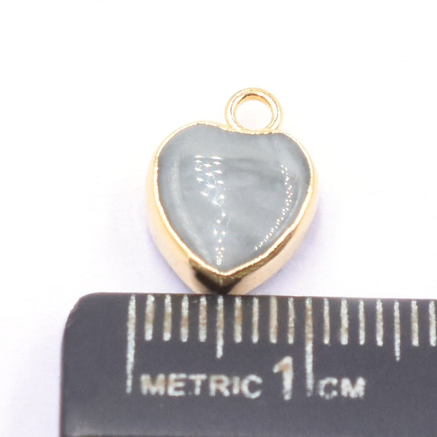 gold plated heart shaped cats eye pendant

